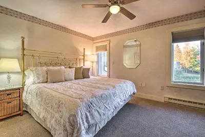 a bedroom with a bed and a ceiling fan at 1 Mi to Jack Frost Ski Resort Water-View Retreat in Lake Harmony