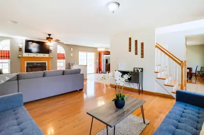 a living room with a couch and a table at Deck, Game Room and Fire Pit Poconos Retreat in Albrightsville