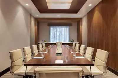 a large conference room with a long table and chairs at Hyatt Place Fort Lee/George Washington Bridge in Fort Lee