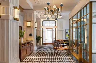 a lobby of a store with a chandelier at Canopy By Hilton Philadelphia Center City in Philadelphia