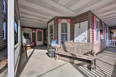 a porch of a house with a bench on it at Central Hummelstown Apt 4 Miles to Hershey Park! in Hummelstown