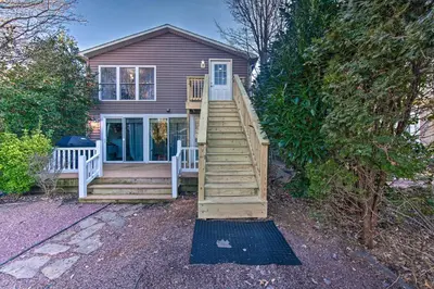 a house with a staircase leading up to a house at Central Hummelstown Apt 4 Miles to Hershey Park! in Hummelstown