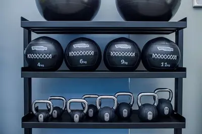 a shelf with dumbbells on it at Canopy By Hilton Jersey City Arts District in Jersey City