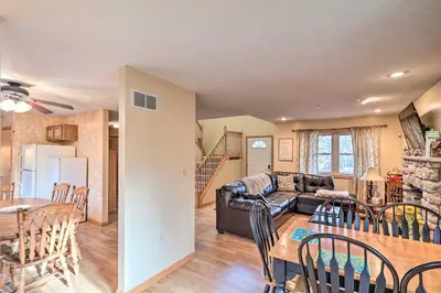 a living room with a couch and a table at Walk to Pool and Lake Albrightsville Vacation Home! in Albrightsville