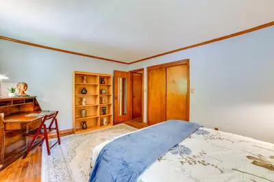 a bedroom with a desk and a bed at Serene Home with On-Site Brook in Callicoon Center in Callicoon Center