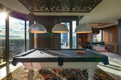 a pool table in a room with a view at W Philadelphia in Philadelphia