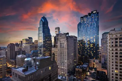 a city skyline with tall buildings at dusk at W Philadelphia in Philadelphia