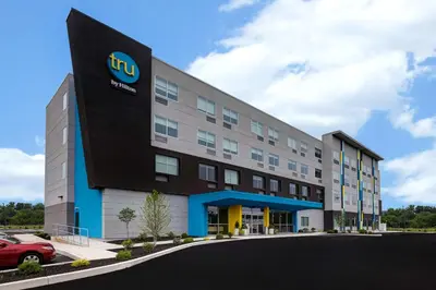 a hotel with a sign on the front of it at Tru By Hilton Grantville, Pa in Grantville