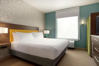 a bedroom with a large bed and a window at Home2 Suites By Hilton Ephrata in Ephrata
