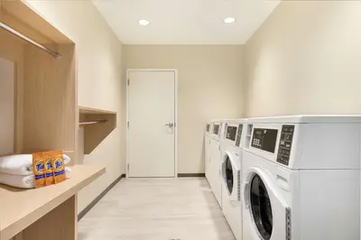 a laundry room with a washer and dryer at Home2 Suites By Hilton Ephrata in Ephrata