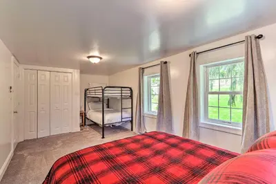 a bedroom with a bed and a window at The Millersburg Mountain House Getaway with Gazebo! in Millersburg