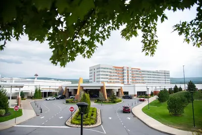 a parking lot in front of a building at Mohegan Pennsylvania Casino Resort - Adults Only in Wilkes-Barre
