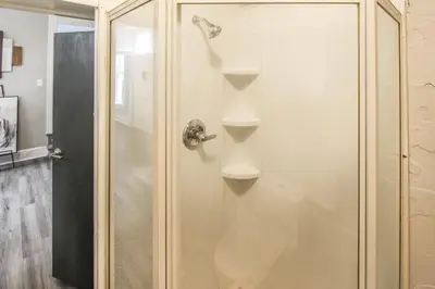 a shower with a glass door with a handle at ☆☆ Modern Coed Dorm in Reading ☆☆ in Reading