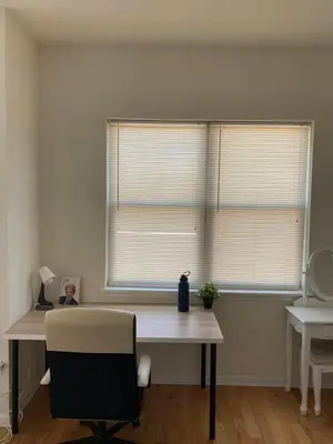an office with a desk with a chair and two windows at Cozy bedrooms at University City in Philadelphia in Philadelphia