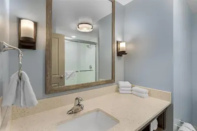 a bathroom with a sink and a mirror at Best Western Plus Hershey in Hershey
