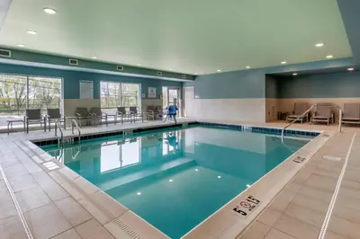 a large swimming pool in a building at Holiday Inn Express & Suites - Lancaster - Mount Joy by IHG in Mount Joy