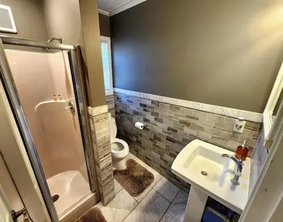 a bathroom with a shower and a sink and a toilet at Paradise in heart of Poconos FaSt InTeRnEt Close to All Attractions in Pocono Summit