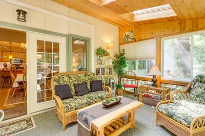 a living room with a couch and a table at Walk to Dining! Townhome 1 Mi to Big Boulder Mtn in Lake Harmony