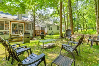 a group of chairs and tables in a yard at Walk to Dining! Townhome 1 Mi to Big Boulder Mtn in Lake Harmony