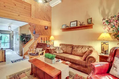 a living room with a couch and a table at Walk to Dining! Townhome 1 Mi to Big Boulder Mtn in Lake Harmony