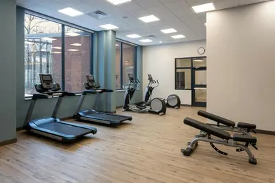 a gym with treadmills and elliptical machines at Residence Inn By Marriott Philadelphia Bala Cynwyd in Bala-Cynwyd