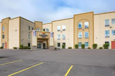 an empty parking lot in front of a hotel at Comfort Inn Apalachin - Binghamton W Route 17 in Apalachin