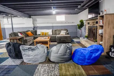 a living room with a couch and two bean bags at Camelback Rd Rancher- On ONE ACRE & near attractions in Tannersville