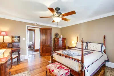 a bedroom with a bed and a ceiling fan at 11 Mi to Jack Frost Resort Winter Family Getaway! in White Haven