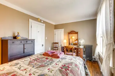 a bedroom with a bed and a dresser and a desk at 11 Mi to Jack Frost Resort Winter Family Getaway! in White Haven