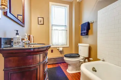 a bathroom with a sink and a toilet and a tub at 11 Mi to Jack Frost Resort Winter Family Getaway! in White Haven