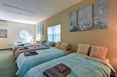 a room with three beds in a room at LAKEFRONT Penthouse at Jack Frost Big Boulder in Lake Harmony