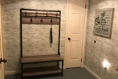 a wooden bench in a room with a wall at LAKEFRONT Penthouse at Jack Frost Big Boulder in Lake Harmony