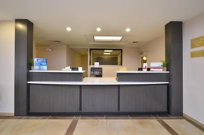 a waiting area in a hospital lobby with a counter at Candlewood Suites Harrisburg-Hershey by IHG in Harrisburg