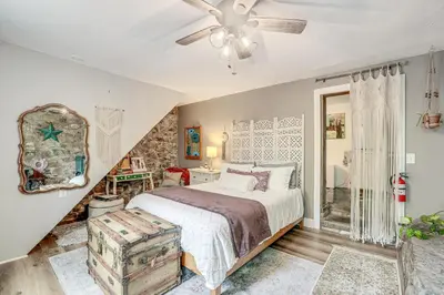 a bedroom with a bed and a ceiling fan at Charming Getaway Less Than 1 Mi to Downtown Lambertville! in Lambertville