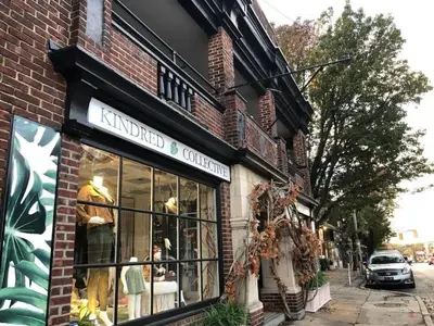 a store front of a brick building on a street at 915CountyLineRoad Luxury Mainline Train Colleges in Bryn Mawr