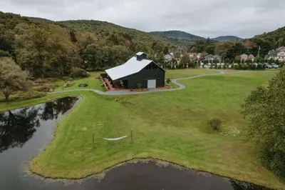 an aerial view of a house on a golf course at Callicoon Hills in Callicoon Center