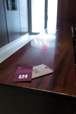 a book sitting on top of a wooden table at Leon Hotel LES in New York
