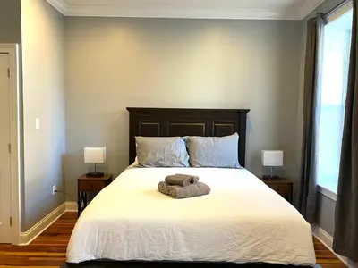 a bedroom with a large white bed with two lamps at AF Stays - Philadelphia 1224 Mt Vernon St in Philadelphia