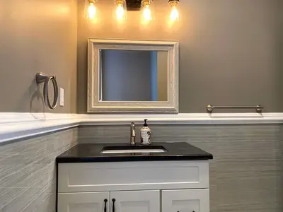 a bathroom with a sink and a mirror at AF Stays - Philadelphia 1224 Mt Vernon St in Philadelphia