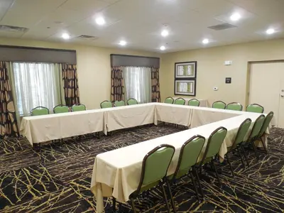 a conference room with a long table and chairs at Hampton Inn & Suites Williamsport - Faxon Exit in Williamsport