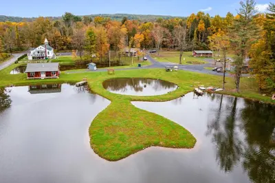 an island in the middle of a lake at 16 Mi to Camelback Resort Getaway with Game Room in Saylorsburg