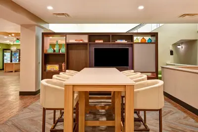 a conference room with a table and chairs at Holiday Inn Lancaster by IHG in Lancaster