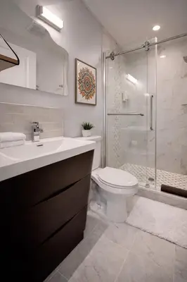 a bathroom with a sink and a toilet and a shower at Artsy Hidden Gem ll -Free Parking -- in Philadelphia