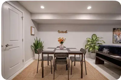a dining room with a table and chairs at Artsy Hidden Gem ll -Free Parking -- in Philadelphia