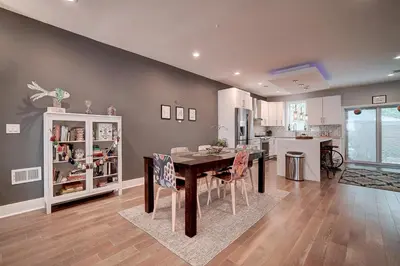 a kitchen and dining room with a table and chairs at Artsy Hidden Gem ll -Free Parking --- in Philadelphia