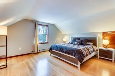 a large bedroom with a bed and a window at Lake Access and Private Hot Tub at Poconos Home! in White Haven