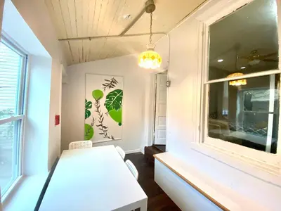 a room with a white table and a window at Legacy - Spring Garden University City in Philadelphia