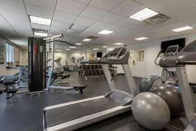 a gym with treadmills and exercise equipment on the floor at Comfort Inn Horsham - Philadelphia in Horsham