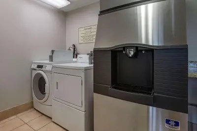 a laundry room with a washer and dryer at Comfort Inn Horsham - Philadelphia in Horsham