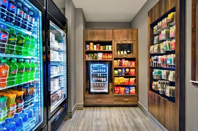 a refrigerator filled with lots of different types of drinks at Residence Inn by Marriott Reading in Wyomissing